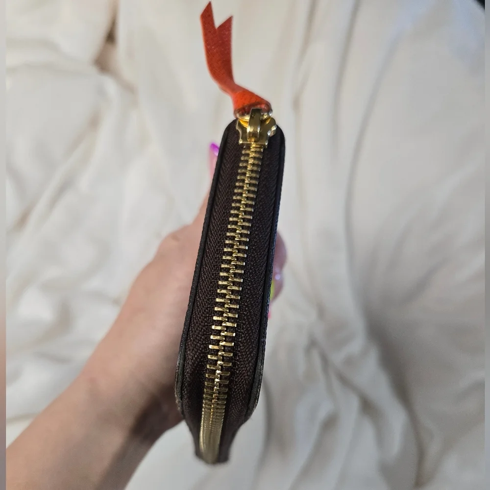 Louis Vuitton Clemence Monogra. Wallet Orange Interior